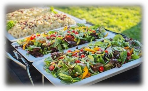 salad in chafer pans in a buffet setting