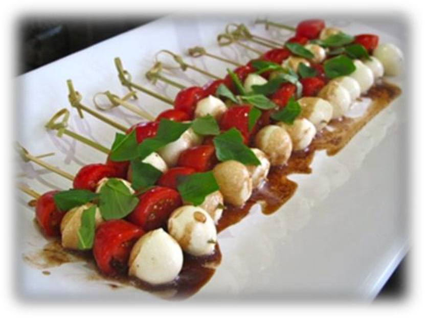 Skewers with mozzarella and tomato's and basil